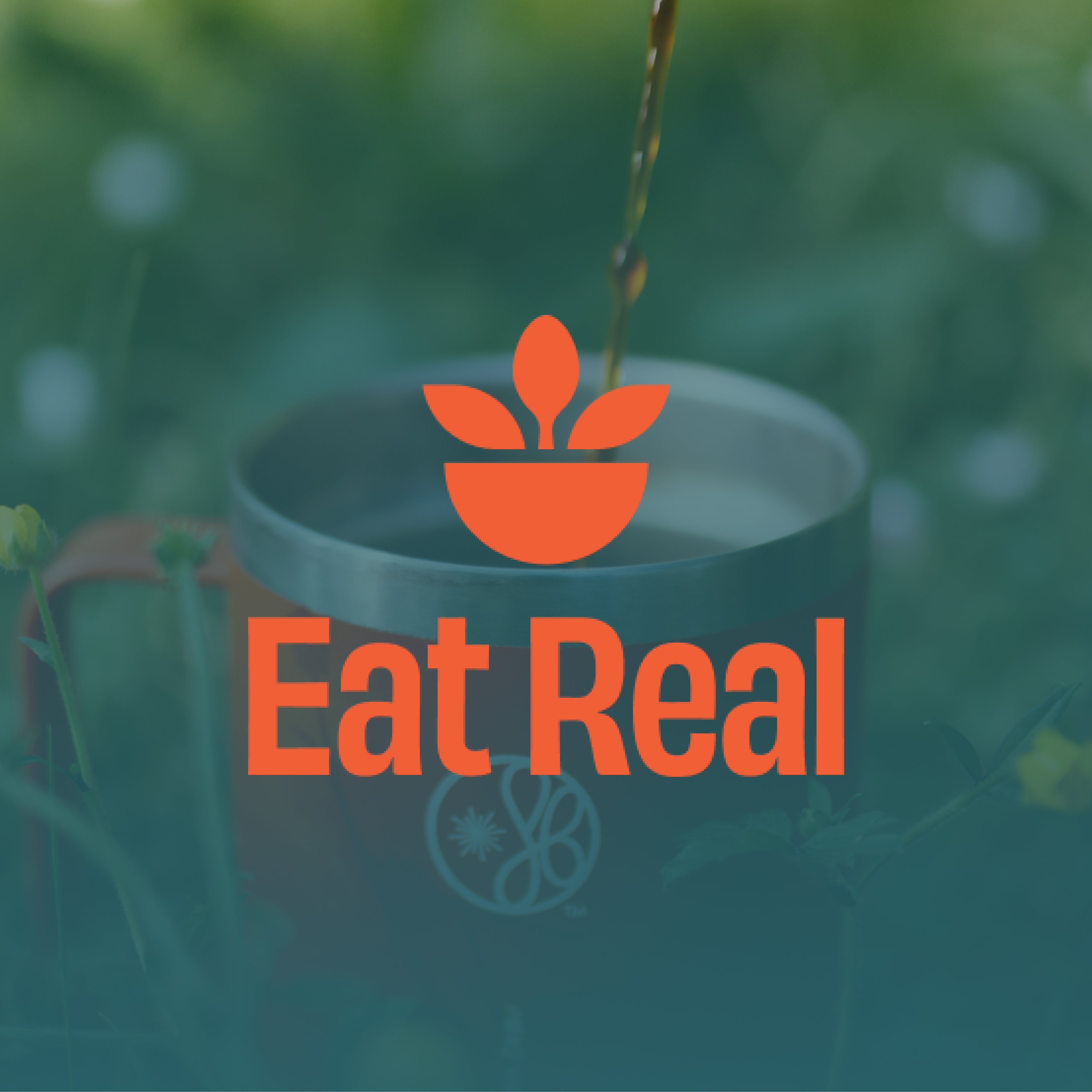Eat Real logo over a scene of plant-based JostArriba adaptogenic coffee being poured into an Eight Billion tumbler in a natural setting. Clean label wellness brand focused on real ingredients, functional mushrooms, and organic, sustainable nutrition